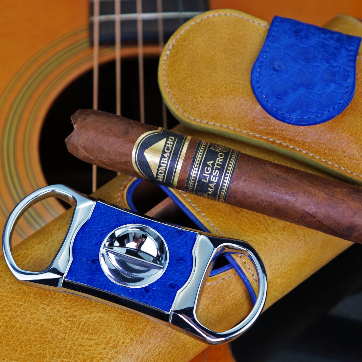 The "V" Cutter - Blue Ostrich and Camel Color Leather
